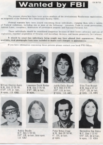 Photo of Weather Underground members wanted by the FBI.  7 people are shown with their names, birthdates, height, weight, hair and eye colors. 